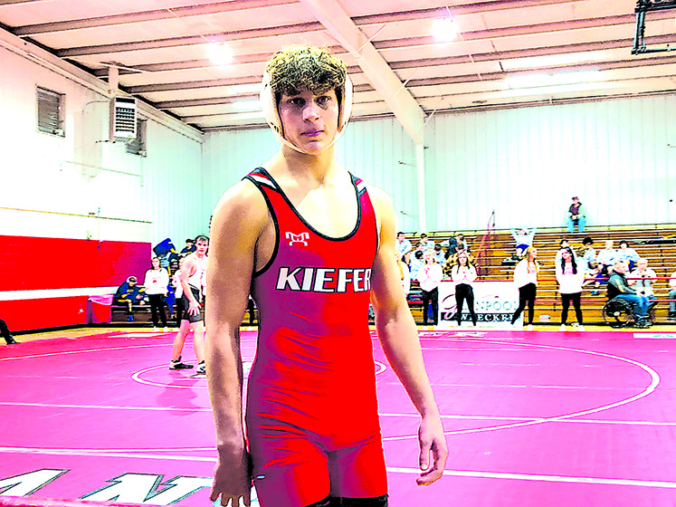 JOHN TRANCHINA PHOTO TEAGEN JAVERSAK placed fourth at 150 pounds at the tournament in Kingfisher last weekend.