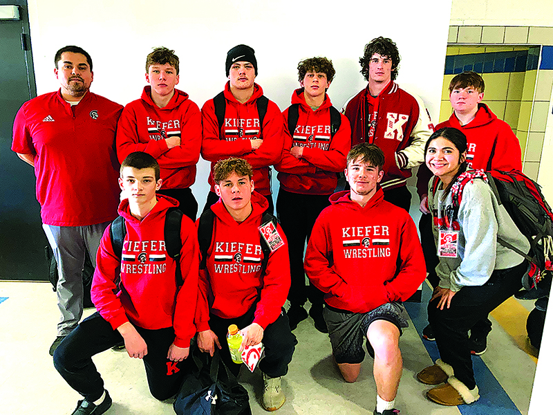 JOHN TRANCHINA PHOTO THE KIEFER WRESTLING TEAM, with Coach Ryan Kowaleski (far left), after placing third in the District 3A-5 dual tournament on Thursday at Berryhill