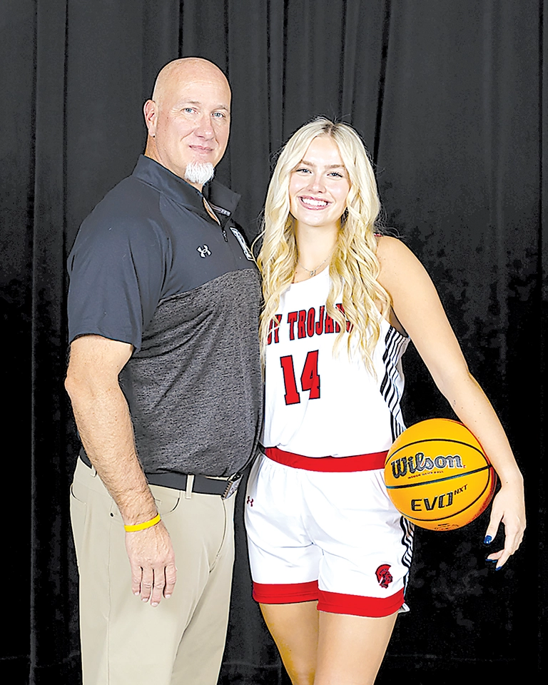 COACH JOHN COONS AND HIS DAUGHTER HANNAH COONS. Hannah, a senior, was injured and missed the entire 2023-24 season.