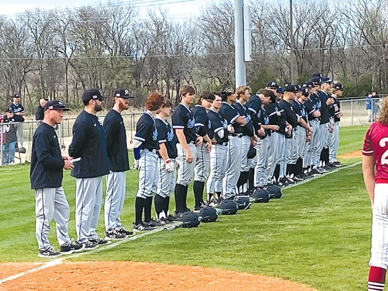 JOHN TRANCHINA PHOTOS
THE SAPULPA CHIEFTAINS, shown as they lined up before the game on Friday at Lincoln
Christian, with coach Steve Irvine far left, defeated the Bulldogs 6-4 for his 201st career victory,
and then left for Gulf Shores.