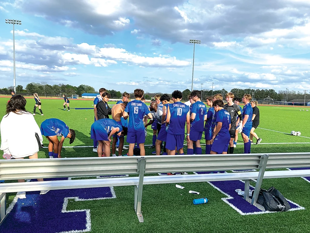 JOHN TRANCHINA PHOTOS SAPULPA COACH DOLAPO SOBOWALE has a spirited discussion with his upset players after their 1-0 loss to Tahlequah Saturday afternoon in the Third Place Game.