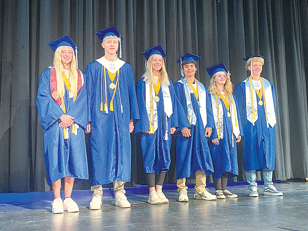 JOHN TRANCHINA PHOTO SAPULPA VALEDICTORIANS smile on the stage at the Senior Assembly this week. Left to right: Ariana Cazzell, Weston Moore, Isabella Leep, Luis Nunez, Loretta Moorman and Isaac Ragsdale.