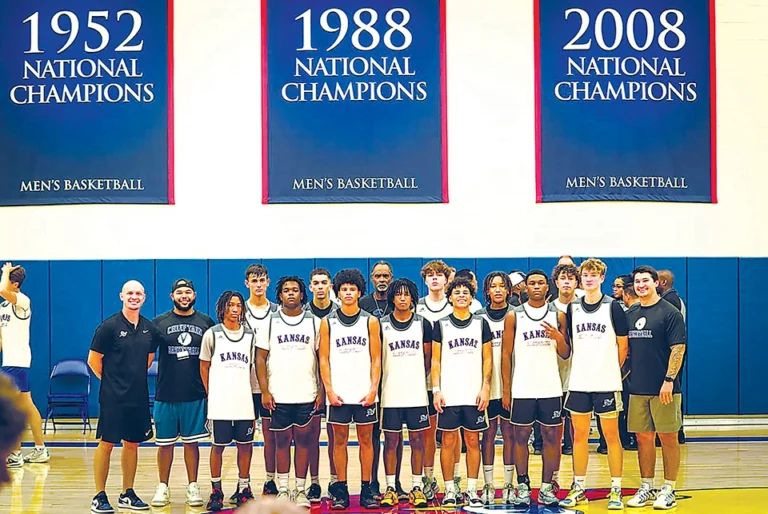 SUBMITTED PHOTO
CHIEFTAINS IN KANSAS The Sapulpa basketball team, shown here standing in front of some
KU championship banners, spent three days at the Jayhawks team camp in Lawrence, learning
a lot and enjoying a lot of team camaraderie.