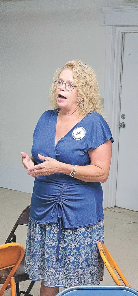 CHARLES BETZLER PHOTO Kim Littrell, OEA, speaks to the Creek County Democrats.