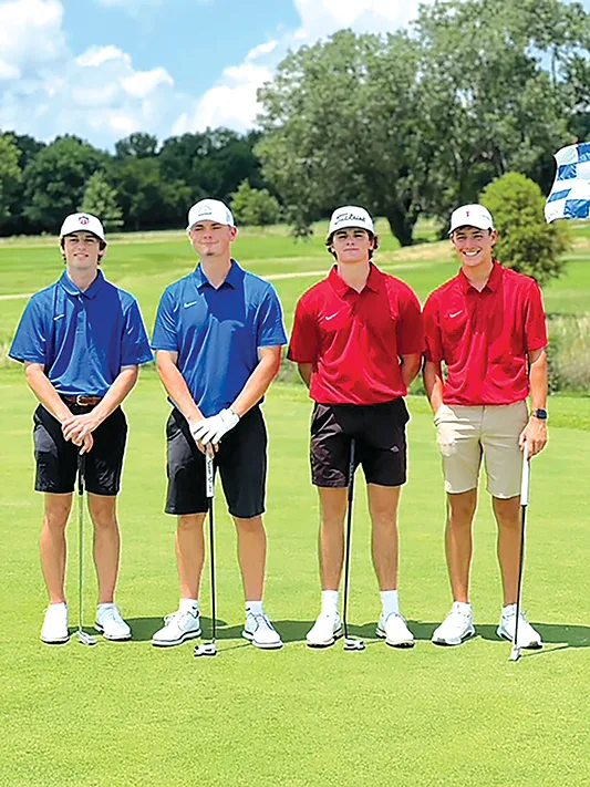 DILLON MACKEY (second from left) with his East teammate Parker Pogue (far left) and West
team rivals Carter Ray and Hunter Baumann on Monday.