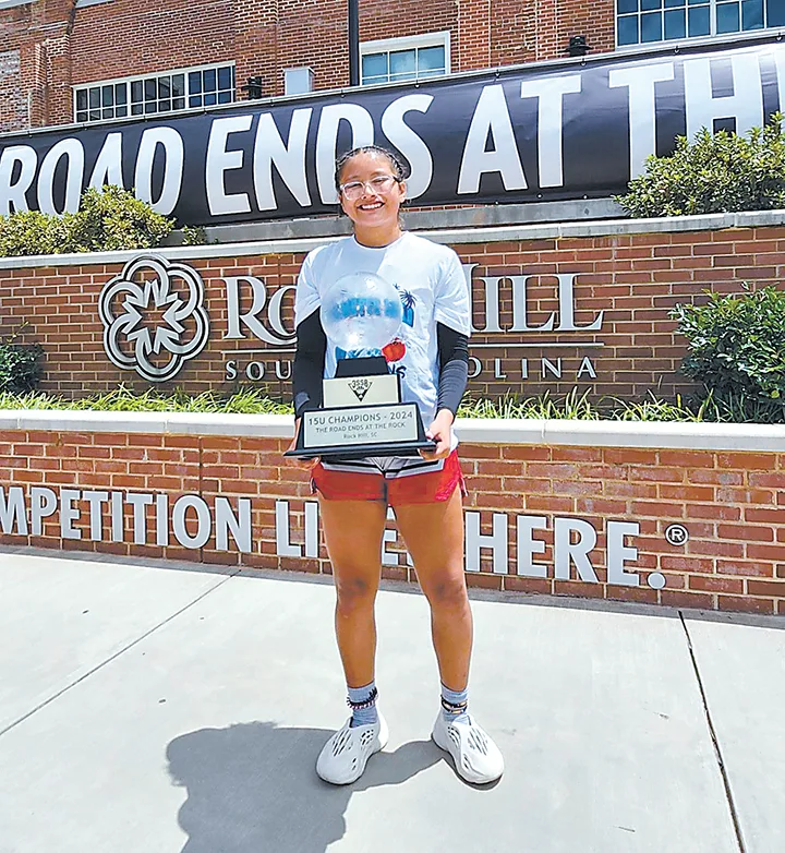 SUBMITTED PHOTOS
SAPULPA’S KIANNA LITTLEBEAR helped Team Trae Young win the 15U 3SSB Adidas National
Championship on Monday in Rock Hill, South Carolina. Here, she shows off the championship
trophy.