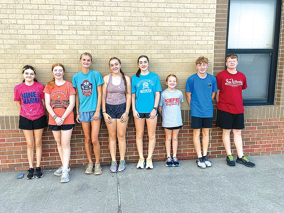 JOHN TRANCHINA PHOTOS KIEFER CROSS COUNTRY gathered at 7 a.m. for practice on Thursday. The Trojans have most of their team returning from last season and Coach NaDenna LaVarnway is optimistic that they will have a strong season.