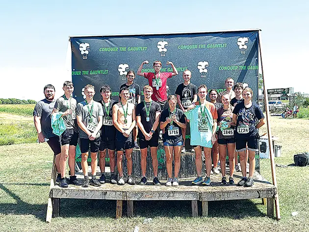 SUBMITTED PHOTOS
KELLYVILLE CROSS COUNTRY endured a difficult challenge on Friday, competing in the
Conquer the Gauntlet event in Bixby, which is far more than just a running race, with
complicated and demanding obstacles to overcome. In addition to the physical and mental
challenges, it was a good team-building experience.