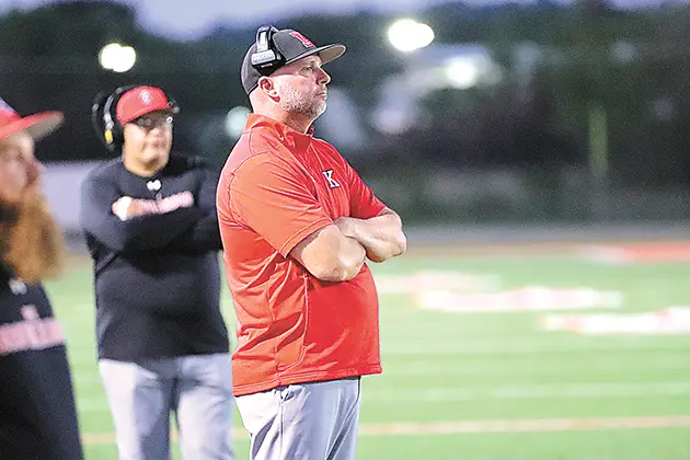 DARREN SUMNER Photo KIEFER COACH TRENT WORLEY looks for answers on the Trojans’ sideline Friday night.