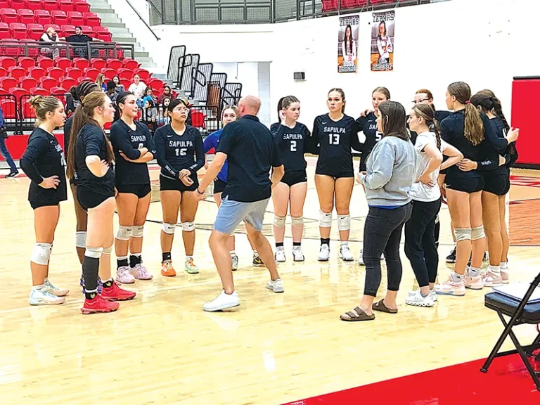 JOHN TRANCHINA PHOTOS
COACH COREY HARP (center) talks to his team during a timeout Monday night during the
Regionals. The Lady Chieftains fell in five sets to No. 3 Claremore in the Regional final, nearly
coming back after dropping the first two.