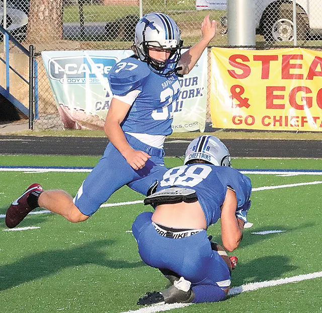 DARREN SUMNER PHOTO EXTRA POINT Sapulpa kicker Coltin Crabtree drills one of his eight extra points Friday night at home for the Chieftains during their huge homecoming victory over OKC Capitol Hill. Gavin Valdez (88) was the holder.