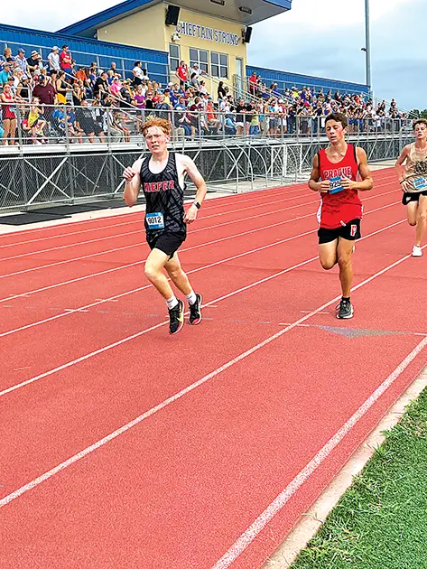 FRESHMAN TOBY YARRINGTON placed 26th overall for the Trojans at Byng, finishing the 5K
race in 19:44