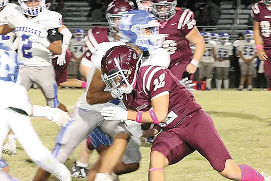 KYLE HILLSBERRY picks up tough yardage against the Hennessey Eagles Thursday night at home for the Kellyville Ponies.