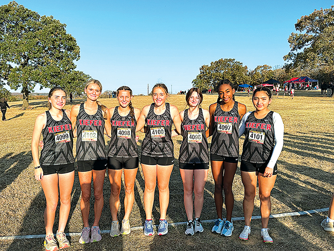 LADY TROJANS HEADING TO STATE! Kiefer cross country girls finished fourth at the 3A East
Regional at Henryetta Saturday, qualifying for next week’s state meet. Left to right: Callie
Hutchison, Coley Rowton, Hanna Hendrix, Kinsey McChesney, Lynlee Anderson, Channing
Hallum and Aileen Rodriguez.