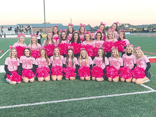 PINK OUT! The Kiefer cheerleaders dressed up in pink at last Thursday’s football game as part of Breast Cancer Awareness Month.