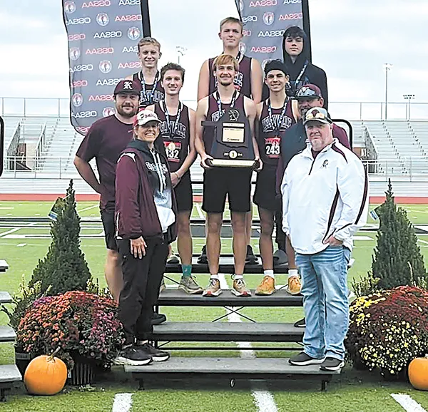 SUBMITTED PHOTO
KELLYVILLE CROSS COUNTRY BOYS TEAM was named Class 2A Academic State
Champions, and also finished 13th on the running course, just the second time the school had
ever qualified for state as a team.