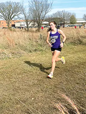 JOHN TRANCHINA PHOTO

CALLIE HUTCHISON, who was used to running two-mile courses, competed in the Oklahoma-
Arkansas All-Star meet on Saturday in Broken Arrow on a 5K course