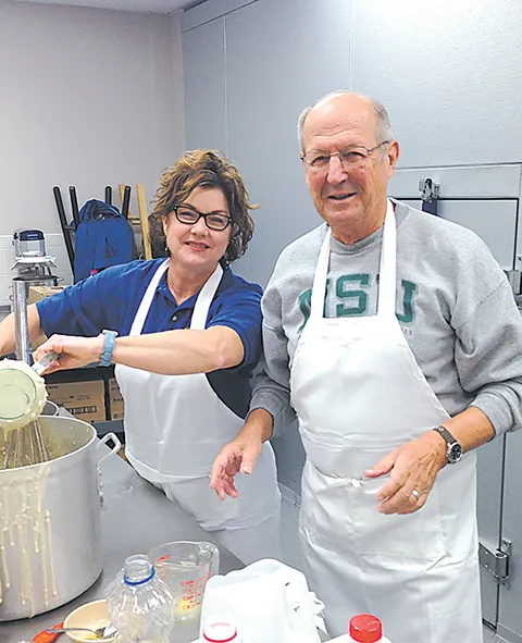 SUBMITTED PHOTO
Sonya Sheffel and Dick White preparing pancakes.
