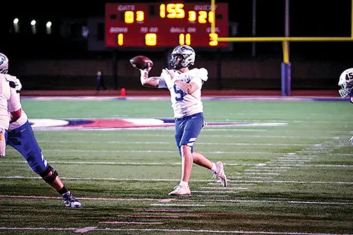 Sophomore quarterback BRADDOX BROUGHTON makes a pass during the Chieftains’ win
over Ponca City several weeks ago.