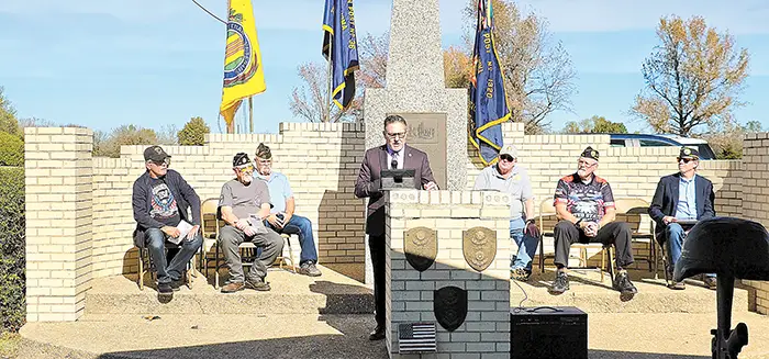 VETERANS HONORED From left to right: Don Harrington, Randy Wheeler, Earl VanSandt,
Todd Gollihare speaking at the podium, Frank Bergschneider, Gary Hendrick and Ricky Wells