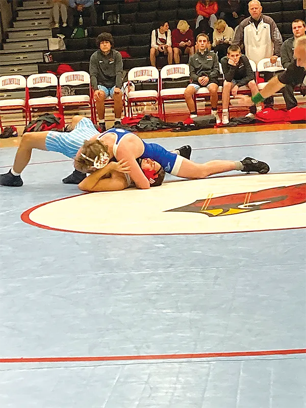 SUBMITTED PHOTO
ANDREW MCCARTHY in the process of pinning his opponent in the dual at Collinsville on
Thursday night. The Chieftains lost a close matchup 44-36 against a powerhouse opponent.