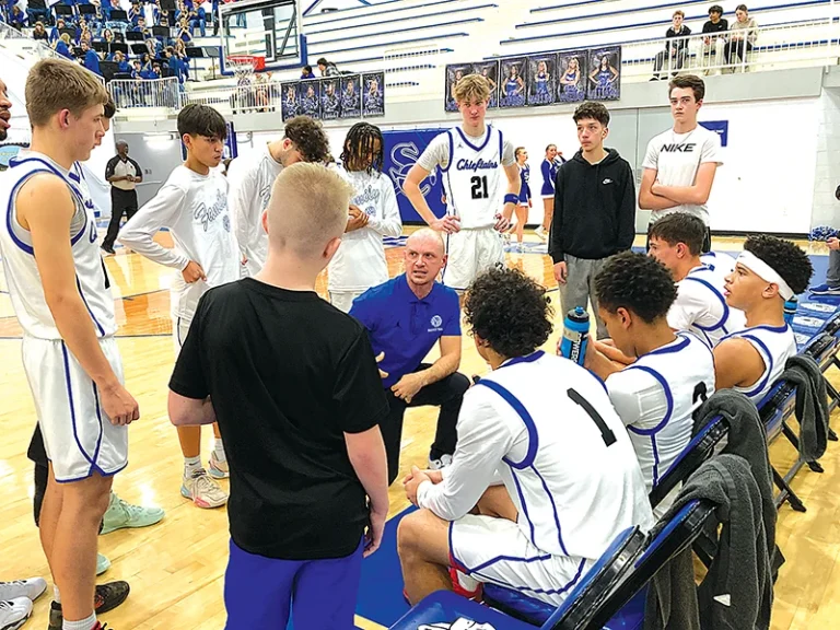 JOHN TRANCHINA PHOTOS
SAPULPA COACH JORDAN NAGEL (center) changed up some tactics at halftime Tuesday
night at the Chieftain Center and they sparked the Chieftains to a dominating 61-22 victory over
Bartlesville, their fourth triumph in a row.