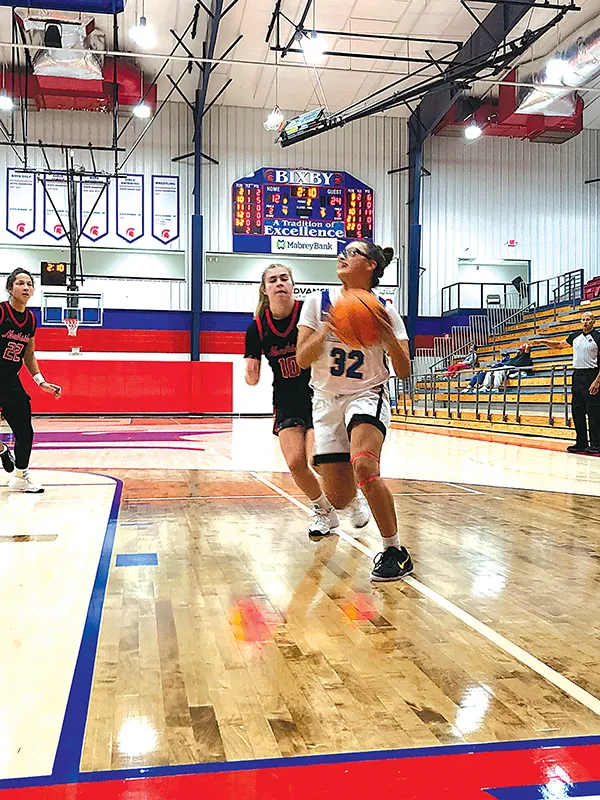 SOPHOMORE KIANNA LITTLEBEAR about to go up for a layup.