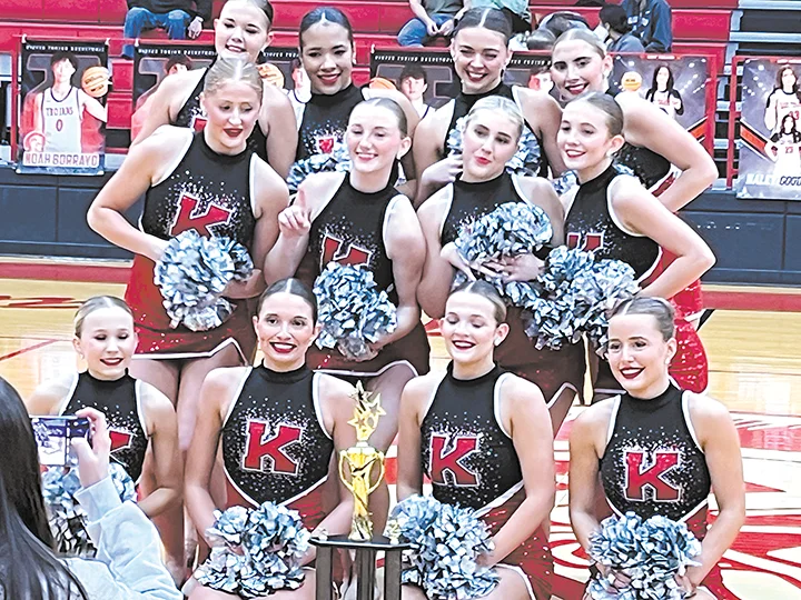 DARREN SUMNER PHOTO
STATE CHAMPIONS! The Kiefer High School Dance team was recognized last week at the
Trojans’ home basketball game with their state championship trophy.