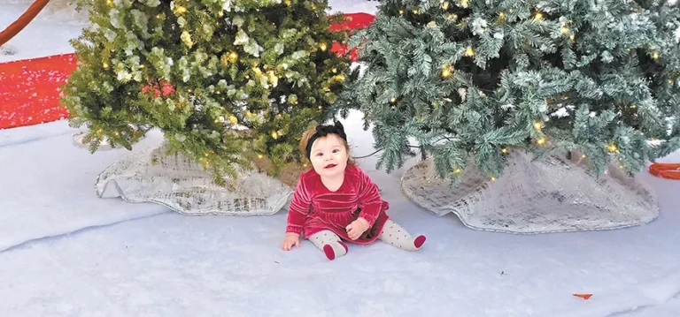 CHARLES BETZLER PHOTO
YOUNG CLARA SIMMONS poses for the camera at Santa Land at Sapulpa D-Luxe Properties
on Sunday December 15th, as the kids were able to take a photo with Santa Claus. See our
print edition’s special Christmas Section with Letters to Santa and more Santa Land photos.