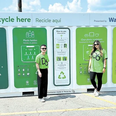 CHARLES BETZLER PHOTO RECYCLING CENTER Vice-President of Marketing, Austin Bogart (left), and Public Relations/ Marketing Manager Danielle Ramsey (right), stand in front of the new Community Recycling Center next to the Murphy Gas Station in the Walmart parking lot.