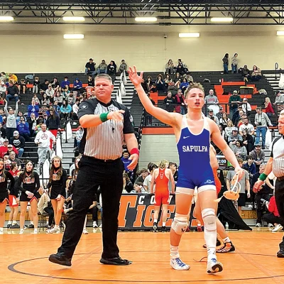 JOHN TRANCHINA PHOTOS ETHAN PETERSON, getting his arms raised after his East Regional championship at 138 pounds, placed fourth at the 5A state tournament on Saturday.