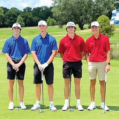 DILLON MACKEY (second from left) with his East teammate Parker Pogue (far left) and West team rivals Carter Ray and Hunter Baumann on Monday.